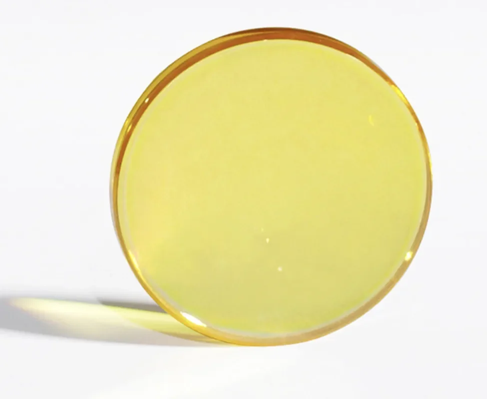 ZnSe Windows for Infrared Spectroscopy and CO2 Laser Optical Systems-Xinkehui Close view of a circular zinc selenide optical window